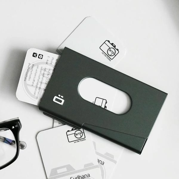 Instant Savings Inside One Touch Business Card Holder